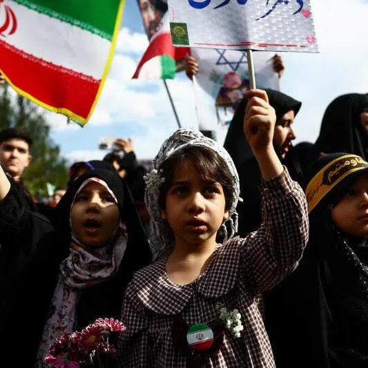 Iranian children attending a ceremony marking 40 days since schoolchildren were killed in a strike on a girls' primary school in Minab, in Tehran, Iran, on April 7, 2026.