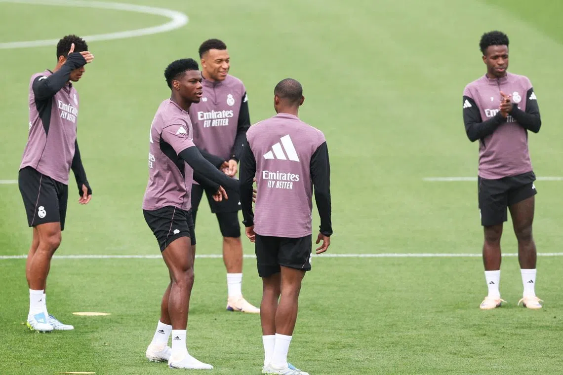 Soccer Football - LaLiga - Real Madrid Training - Ciudad Real Madrid, Valdebebas, Madrid, Spain - May 9, 2026 Real Madrid's Kylian Mbappe, Jude Bellingham, Aurelien Tchouameni and Vinicius Junior during training REUTERS/Isabel Infantes