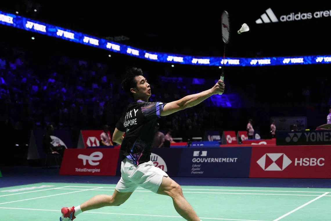 Singapore's Kean Yew Loh plays a shot to Mauritius's Georges Julien Pau in their men's singles badminton match at the Badminton BWF World Championship in Paris, on August 25, 2025.