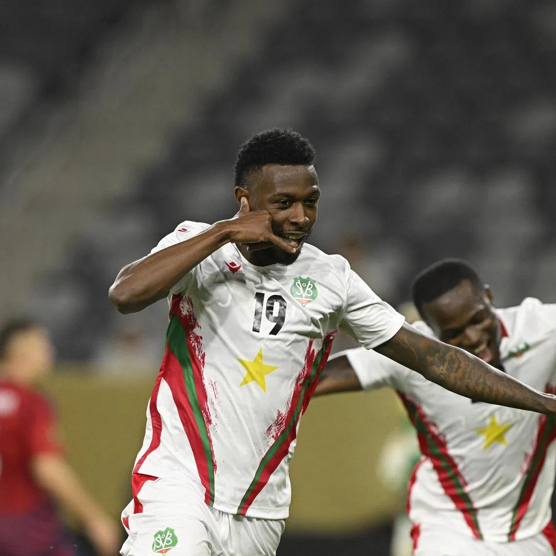 Suriname defender Shaquille Pinas celebrates scoring against Costa Rica in a group stage match of the 2025 Gold Cup.