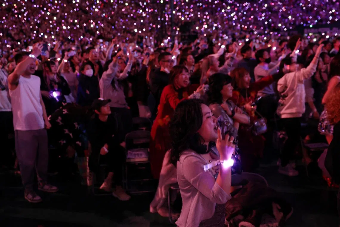 Some domestic concert-goers feel foreign fans do not share the rather restrained Japanese approach to taking in a show.
