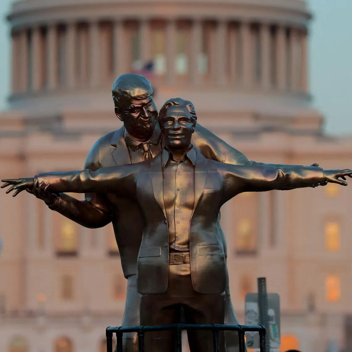 The statue showed Epstein standing at the bow of a ship with his arms stretched out, while Mr Trump stood behind him holding his wrists.