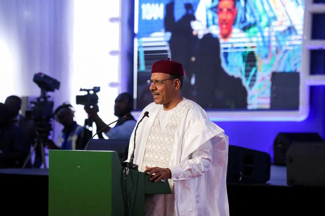 FILE PHOTO: Mohamed Bazoum, who was ousted as Niger's president in a coup on July 26, speaks during the commissioning of Dangote Petroleum refinery in Ibeju-Lekki, Lagos, Nigeria May 22, 2023. REUTERS/Temilade Adelaja/File Photo