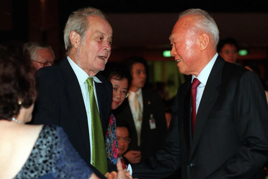 Singapore's first law minister E.W. Barker (left) and founding prime minister Lee Kuan Yew in 1998.