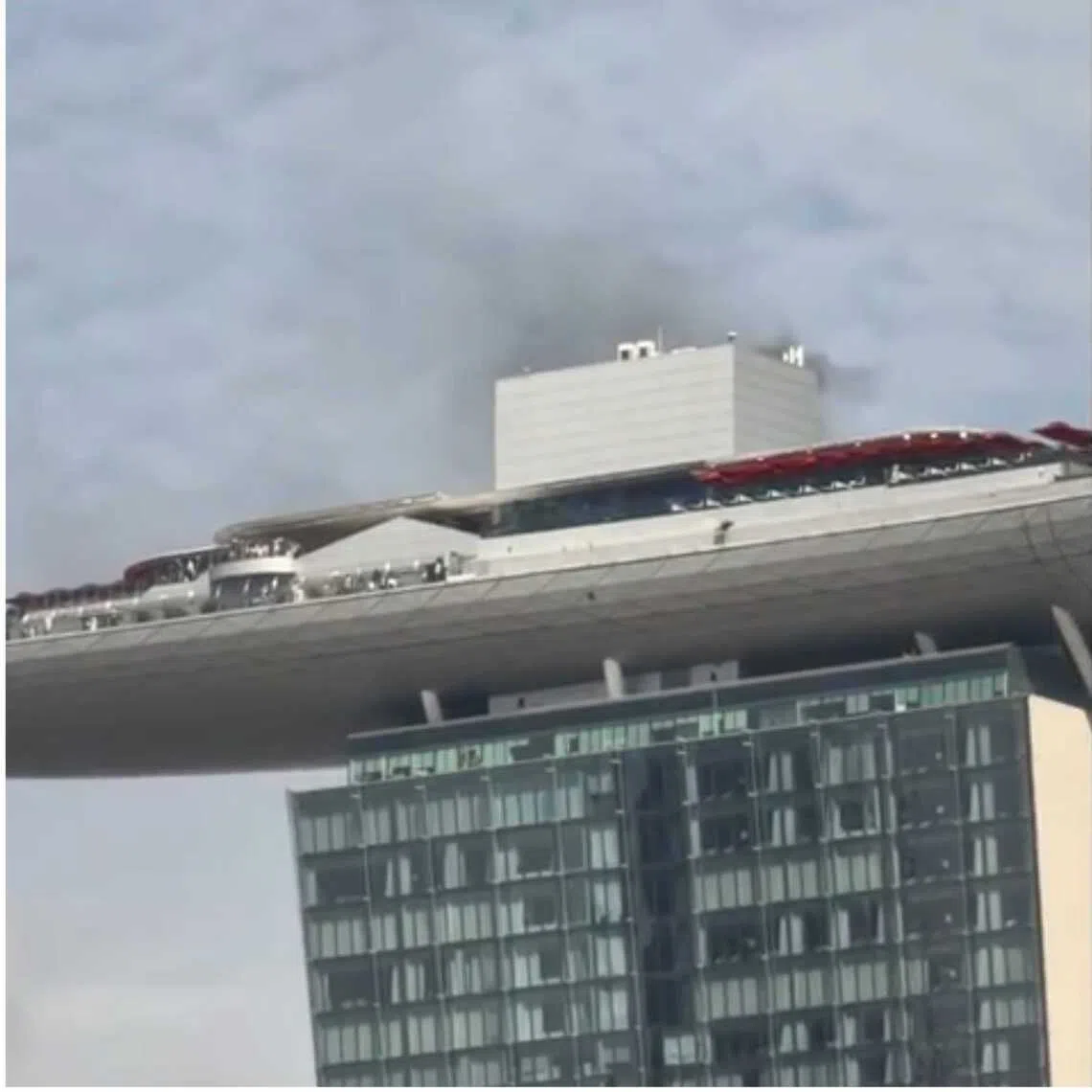 Smoke is seen at the Marina Bay Sands rooftop, on Oct 28, 2025.