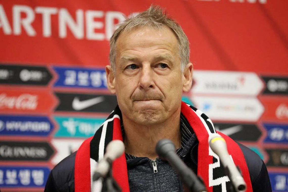 FILE PHOTO: South Korean national soccer team's new head coach Juergen Klinsmann speaks upon his arrival at Incheon International Airport in Incheon, South Korea, March 8, 2023.   REUTERS/Kim Soo-hyeon/File Photo