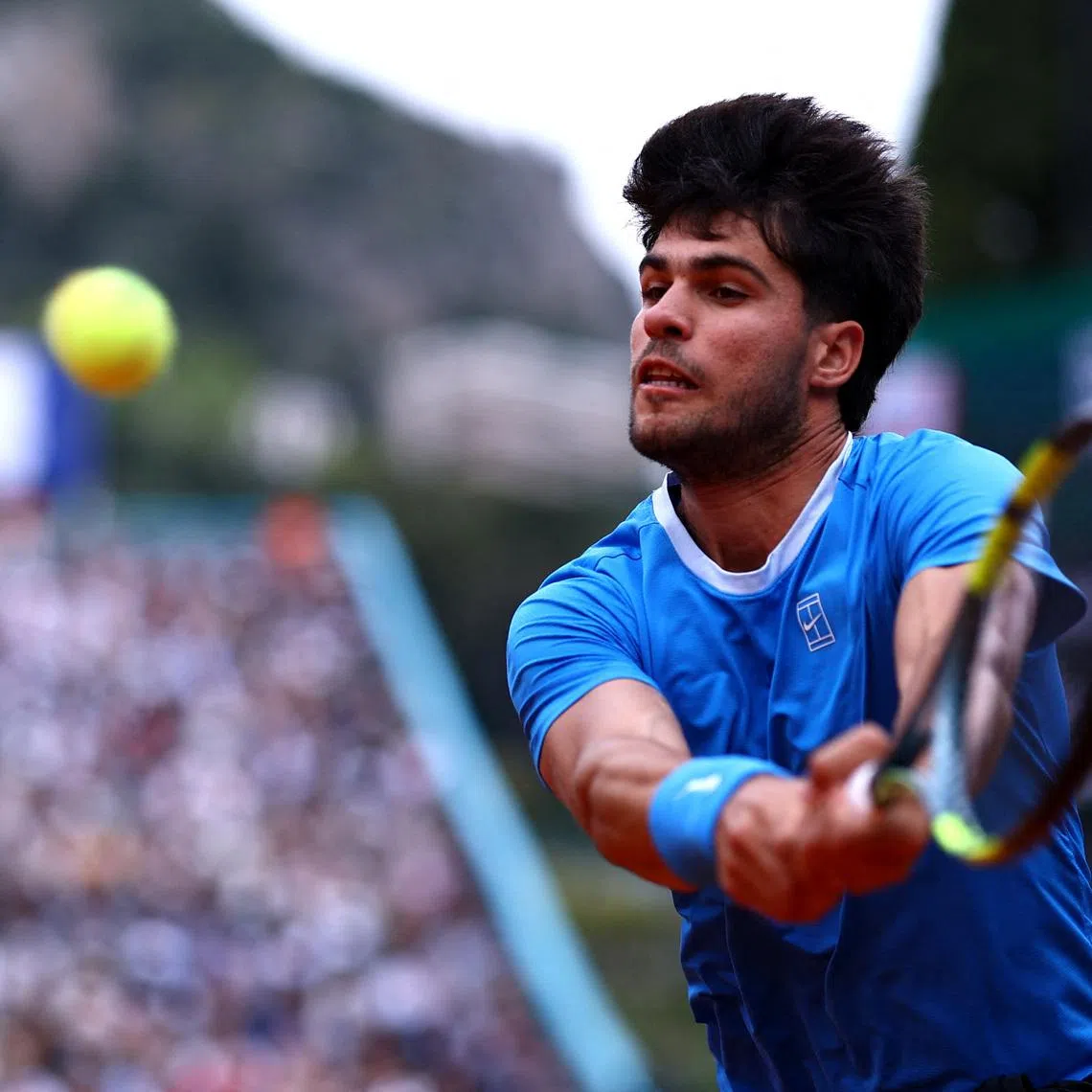 Tennis - ATP Masters 1000 - Monte Carlo Masters - Monte Carlo Country Club, Roquebrune-Cap-Martin, France - April 12, 2026 Spain's Carlos Alcaraz in action during his final match against Italy's Jannik Sinner REUTERS/Manon Cruz/File Photo