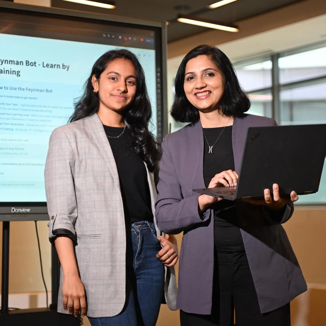 (From left) Singapore University of Technology and Design (SUTD) alumnus Akshaya Rajesh, GenAI engineer, and Dr Sumbul Khan, senior lecturer in SUTD's Science, Mathematics, and Technology cluster, on Oct 28, 2025. 