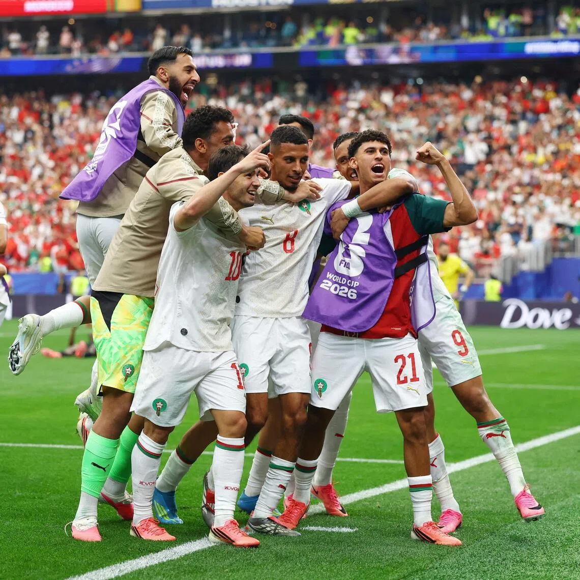 Soccer Football - FIFA World Cup 2026 - Round of 16 - Canada v Morocco - Houston Stadium, Houston, Texas, U.S. - July 4, 2026
Morocco's Azzedine Ounahi celebrates scoring their second goal with teammates REUTERS/Hannah Mckay     TPX IMAGES OF THE DAY