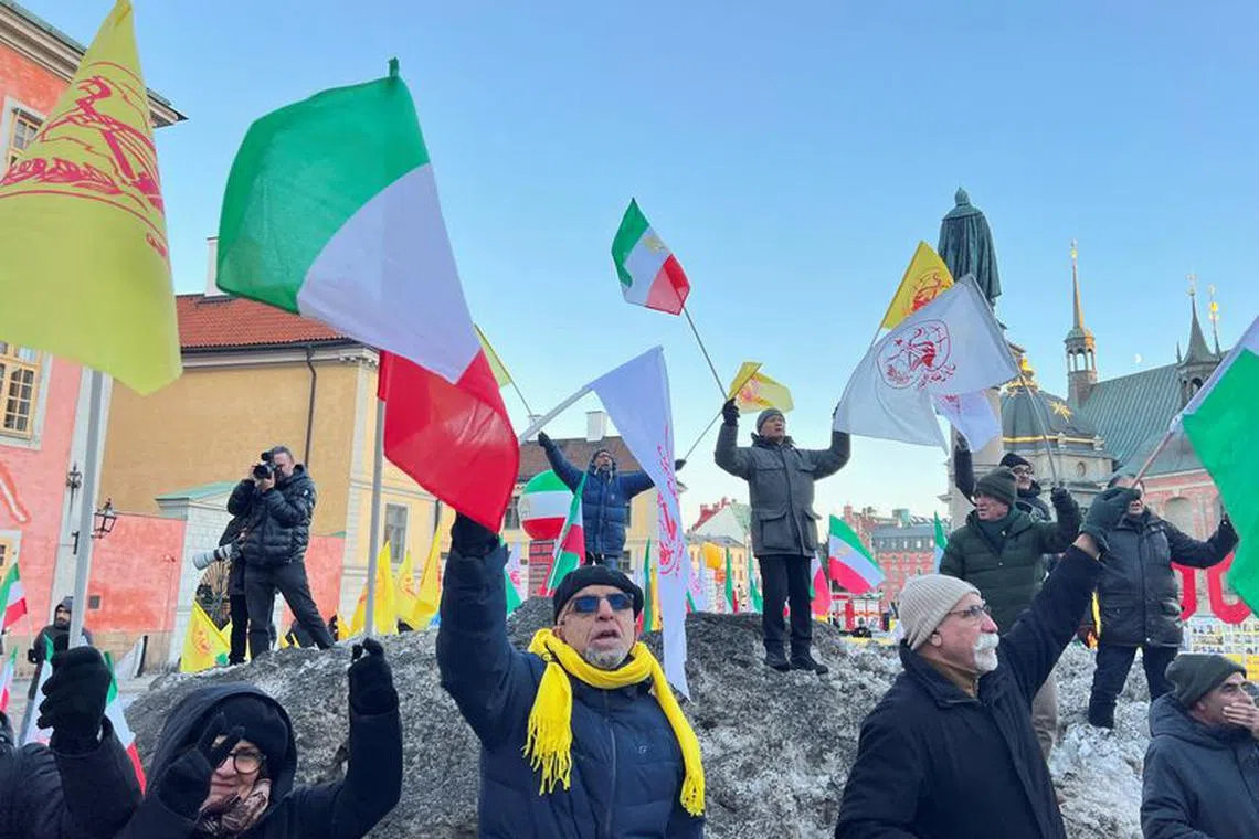 Protestors celebrate the guilty verdict of Hamid Noury in Stockholm, Sweden, December 19, 2023. REUTERS/Johan Ahlander/File Photo