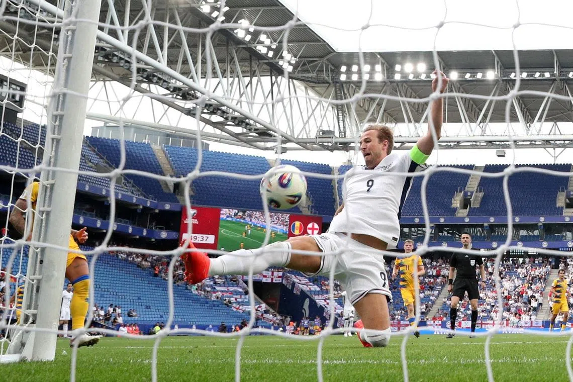 FILE PHOTO: Soccer Football - World Cup - European Qualifiers - Group K - Andorra v England - RCDE Stadium, Cornella de Llobregat, Spain - June 7, 2025 England's Harry Kane scores their first goal REUTERS/Albert Gea/File Photo