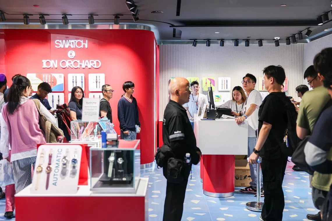 Shoppers queueing at the Swatch Ion Orchard outlet during the launch of the Royal Pop watch collection on May 16.