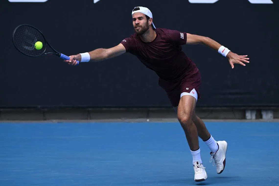 Tennis - Australian Open - Melbourne Park, Melbourne, Australia - January 22, 2026 Russia's Karen Khachanov in action during his second round match against Nishesh Basavareddy of the U.S. REUTERS/Jaimi Joy