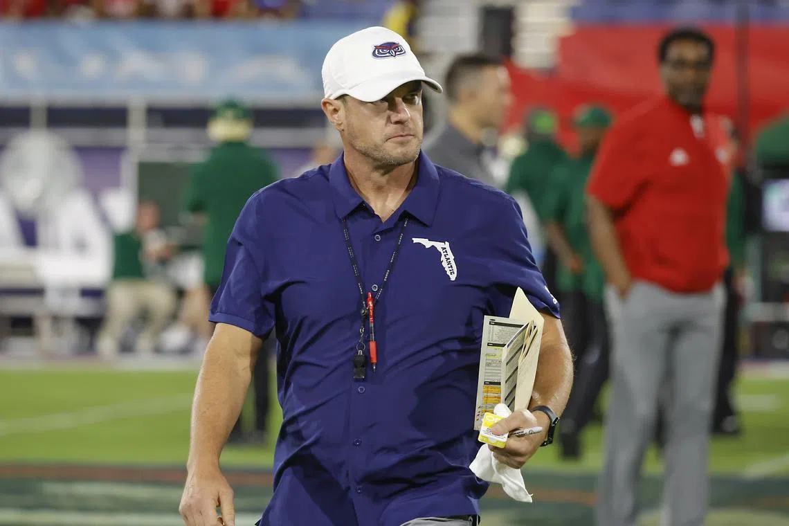 Nov 1, 2024; Boca Raton, Florida, USA;  Florida Atlantic Owls head coach Tom Herman walks on the field before the game against the South Florida Bulls at FAU Stadium. Mandatory Credit: Reinhold Matay-Imagn Images/ File Photo