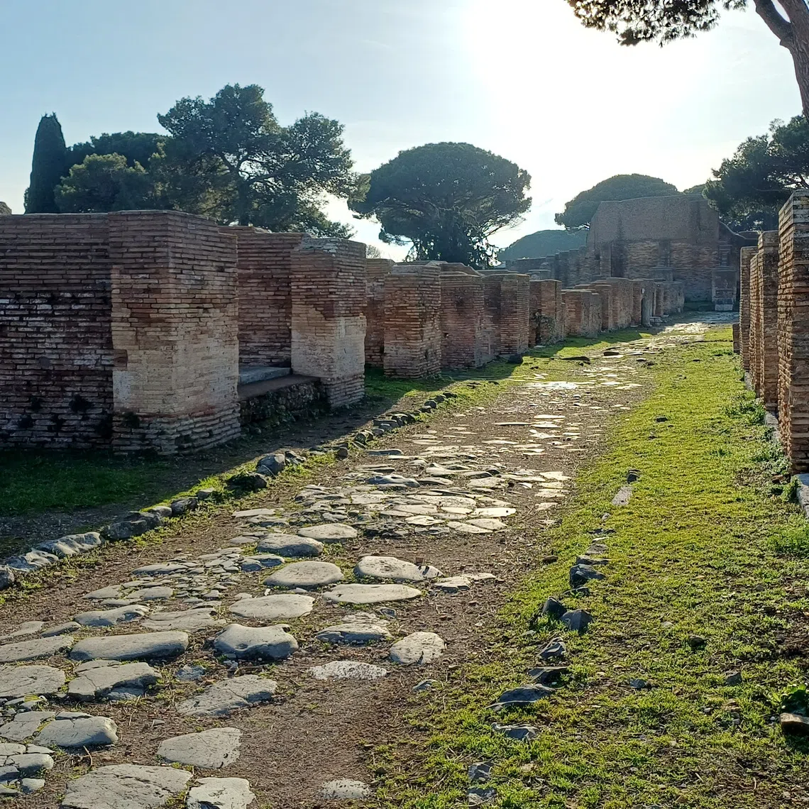 A street in Ostia, the ancient seaport of Rome, Italy, at the mouth of the river Tiber. While the Romans preferred building straight roads, difficult terrain sometimes frustrated that goal, a study has found.