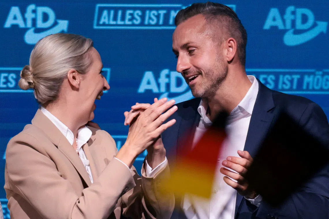 FILE PHOTO: Alternative for Germany (AfD) party co-leader Alice Weidel and Ulrich Siegmund, the top candidate of the far-right Alternative for Germany (AfD) party in Germany's Saxony-Anhalt state election, attend the party's campaign kick-off event ahead of the Saxony-Anhalt state election, in Magdeburg, Germany, July 18, 2026. REUTERS/Christian Mang/File Photo