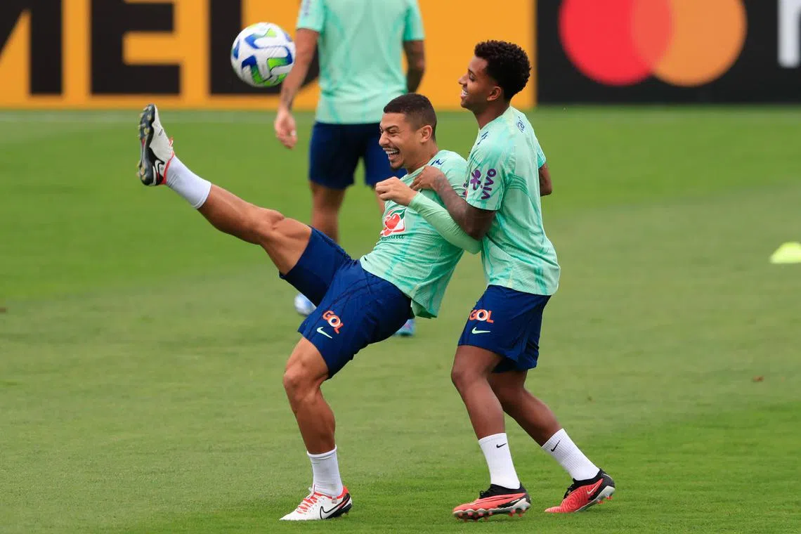 Brazil's Andre (left) and Rodrygo during training at Granja Comary, Rio de Janeiro, on Nov 19 ahead of their World Cup qualifier against Argentina at the Maracana on Nov 21.