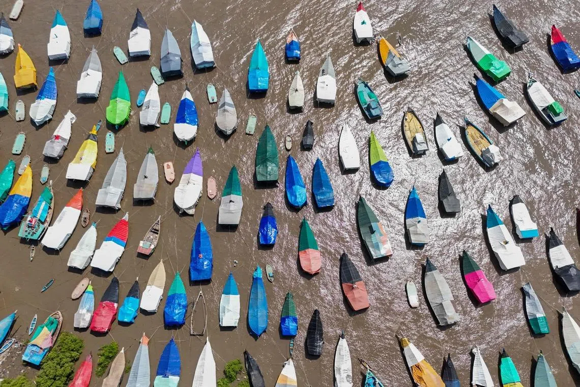 Fishing boats anchored near Uttan village, on the outskirts of Mumbai, on June 14, 2026.