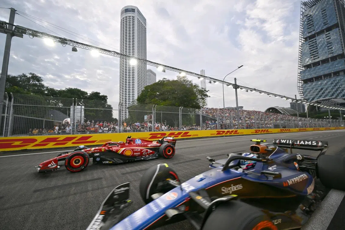 Spanish driver Carlos Sainz Jr of Scuderia Ferrari and Argentinian driver Franco Colapinto of Williams Racing, during practice 3 of the Formula One Singapore Airlines Singapore Grand Prix, at the Marina Bay street circuit on Sept 21, 2024.