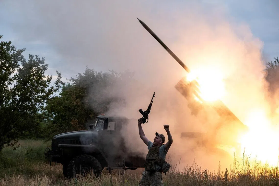 A Ukrainian serviceman and his colleagues firing a BM-21 Grad multiple launch rocket system towards Russian troops, near the front-line town of Kostiantynivka, Ukraine, on June 4.