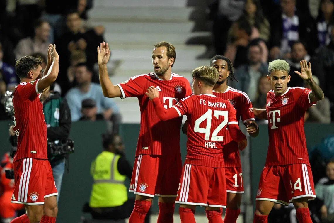 Bayern Munich’s Harry Kane (second from left) celebrating with teammates after Michael Olise (second from right) scored in a 4-1 win over VfL Osnabruck on Sept 2.