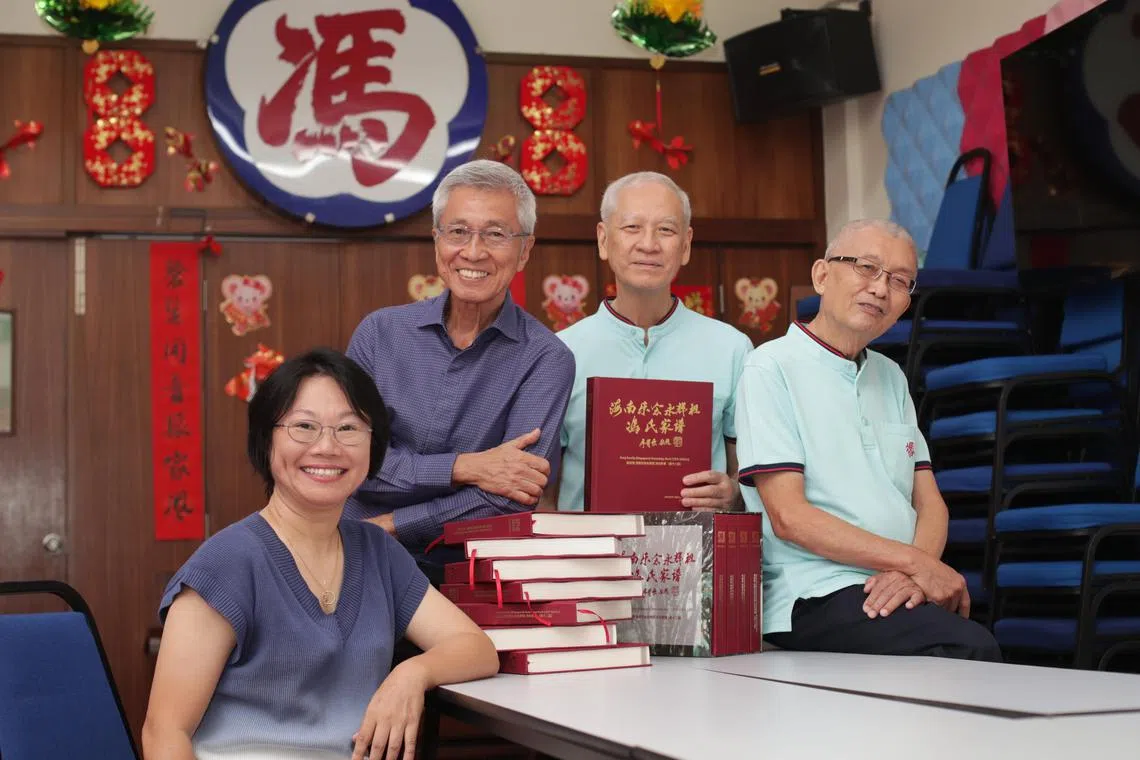 Fong Clan General Association president Pang Seow Khee (second from right) with the book's co-editors (from left) Pang Sze Yunn, Pang Eng Fong and Pang Eng Ding.