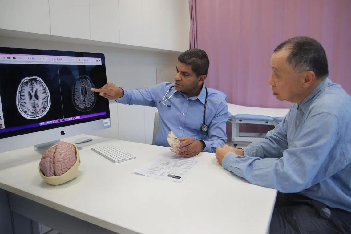 Associate Professor Nagaendran Kandian with Biocis participant Michael Chin.