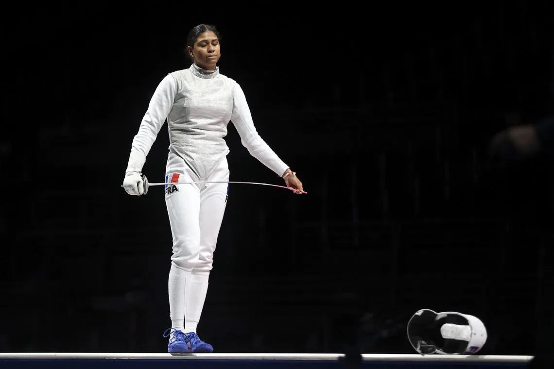 Tokyo 2020 Olympics - Fencing - Women's Team Foil - Gold medal match - Makuhari Messe Hall B - Chiba, Japan - July 29, 2021. Ysaora Thibus of France reacts REUTERS/Carl Recine
