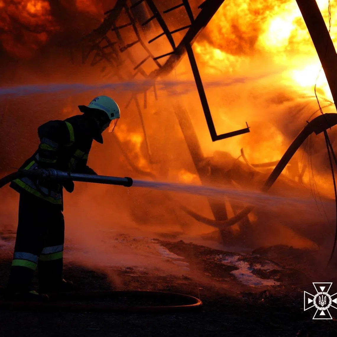 A firefighter works at a critical infrastructure facility hit by Russian drone strikes, amid Russia's attack on Ukraine, in Odesa Region, Ukraine April 10, 2026. Press service of the State Emergency Service of Ukraine in Odesa region/Handout via REUTERS ATTENTION EDITORS - THIS IMAGE HAS BEEN SUPPLIED BY A THIRD PARTY. DO NOT OBSCURE LOGO.