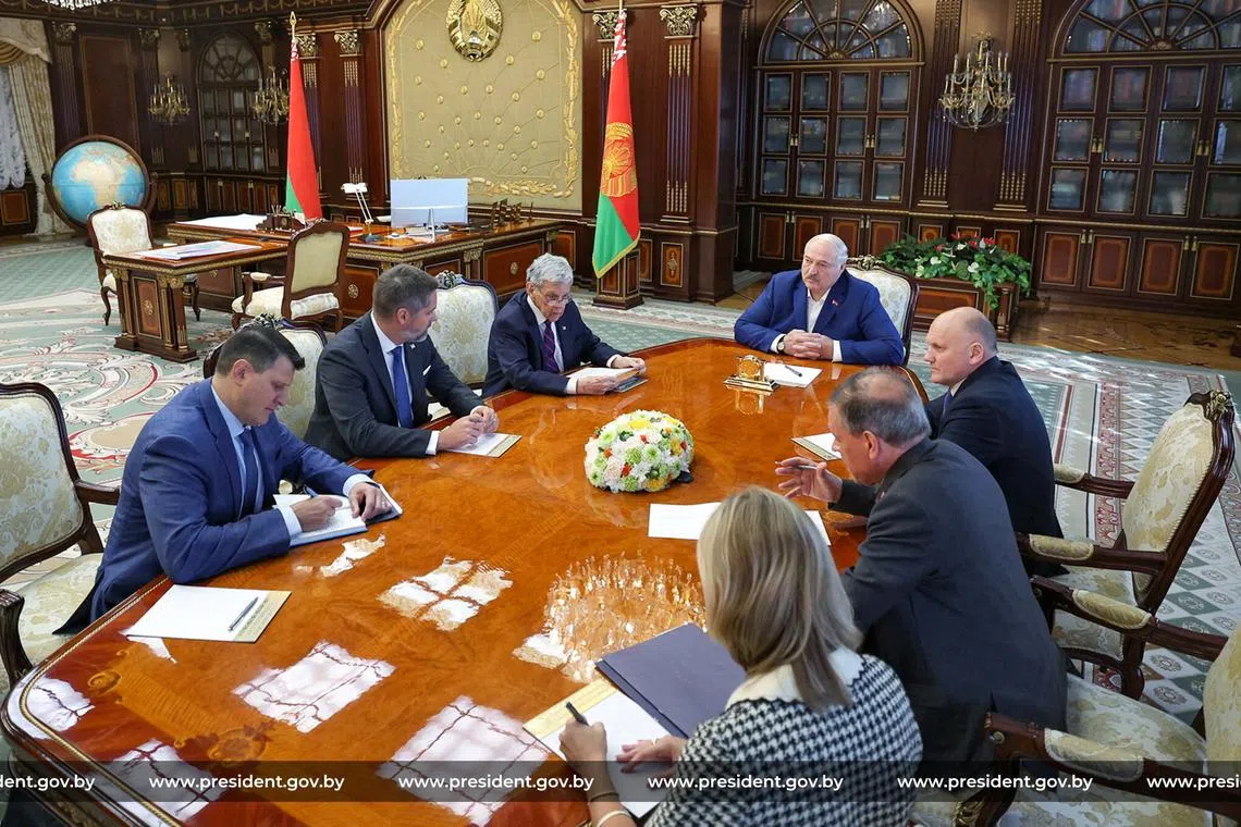 Members of the delegations, led by Belarusian President Alexander Lukashenko and John Coale, a representative of U.S. President Donald Trump, attend a meeting in Minsk, Belarus September 11, 2025. Press Service of the President of the Republic of Belarus/Handout via REUTERS