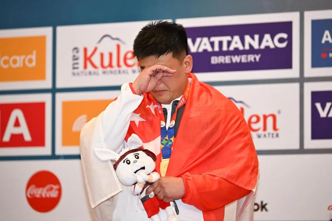 History was made by Timothy Loh, who shed tears of joy after winning the men's freestyle 125kg gold for Singapore's first wrestling success. 