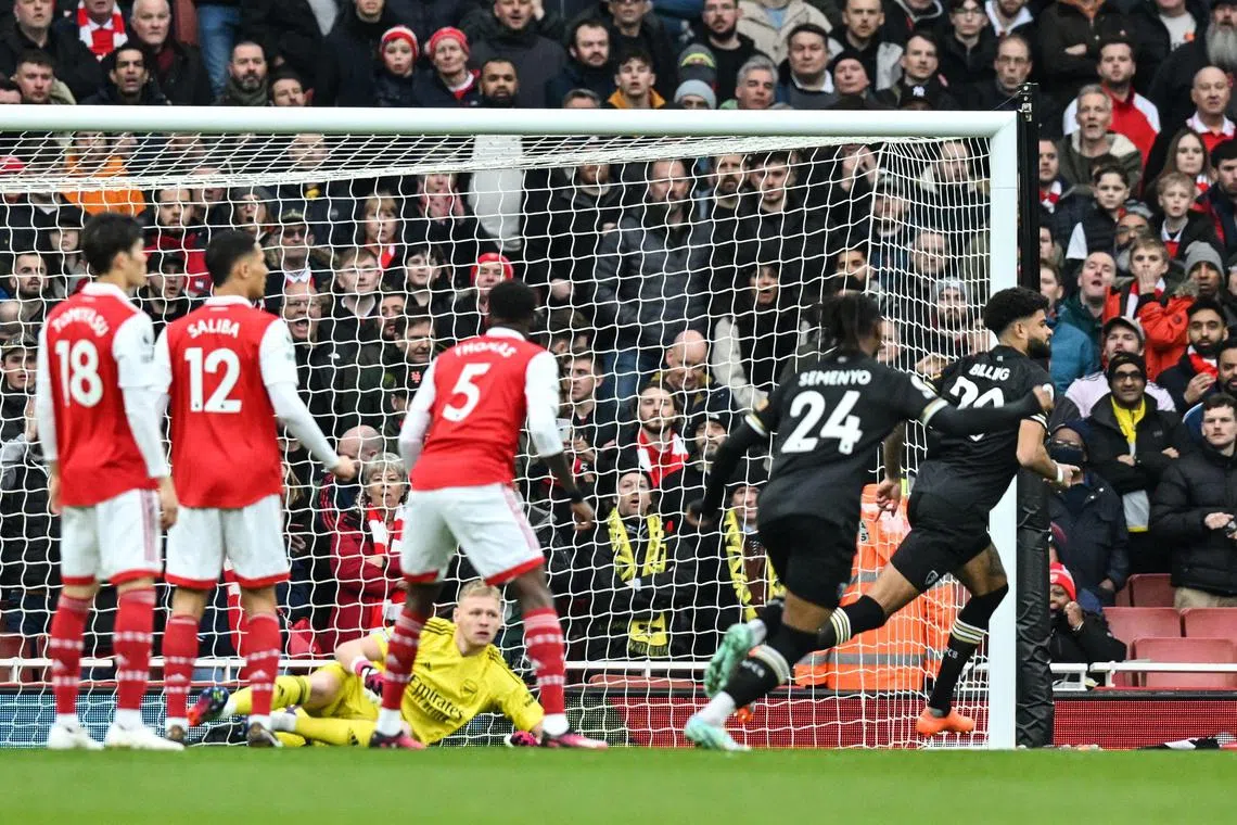 Bournemouth's Danish midfielder Philip Billing (right) celebrates after scoring against Arsenal.