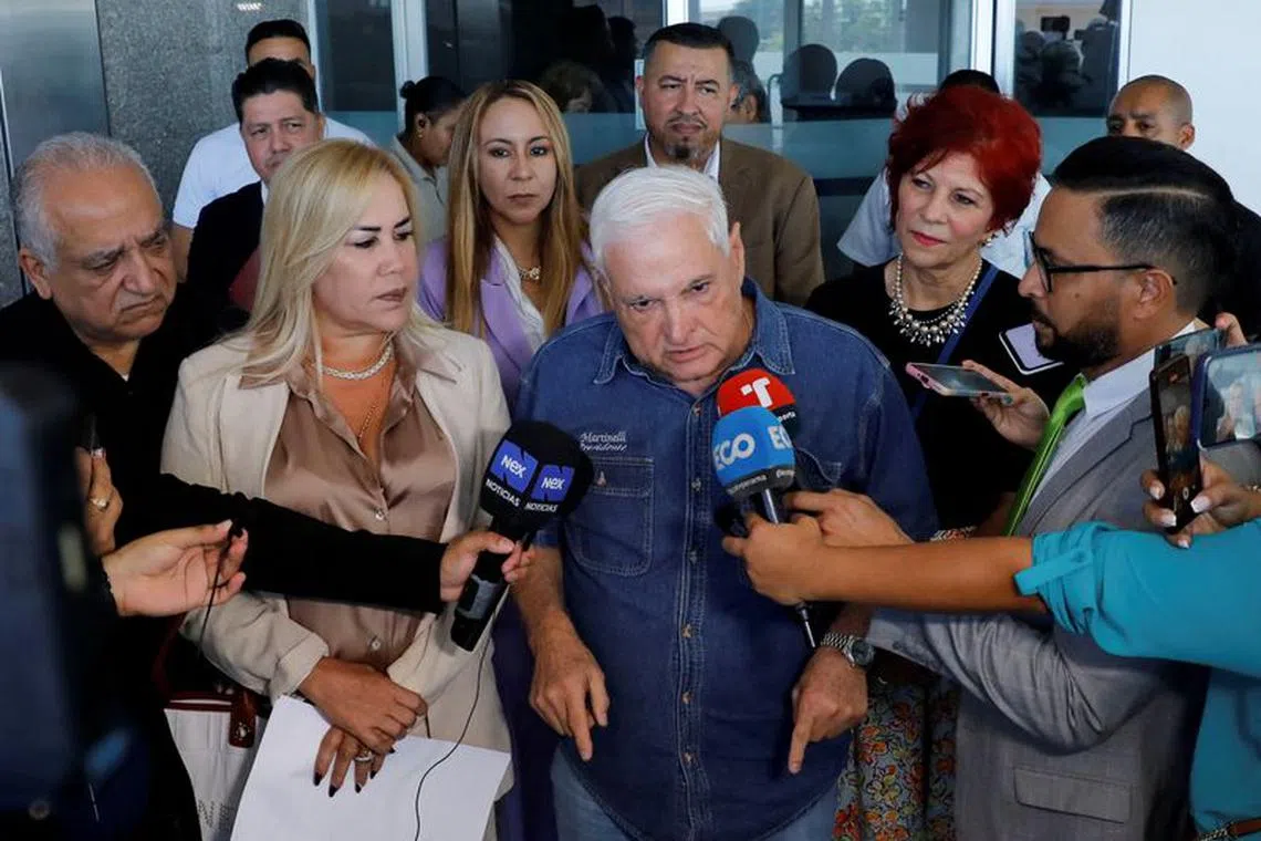 Panama's former President Ricardo Martinelli addresses the media, accompanied by his lawyer Shirley Castaneda, after filing a complaint with the General Secretariat of the National Assembly to investigate Panamanian President Laurentino Cortizo and Vice President, Jose Gabriel Carrizo, in Panama City, Panama, February 6, 2024. REUTERS/Aris Martinez
