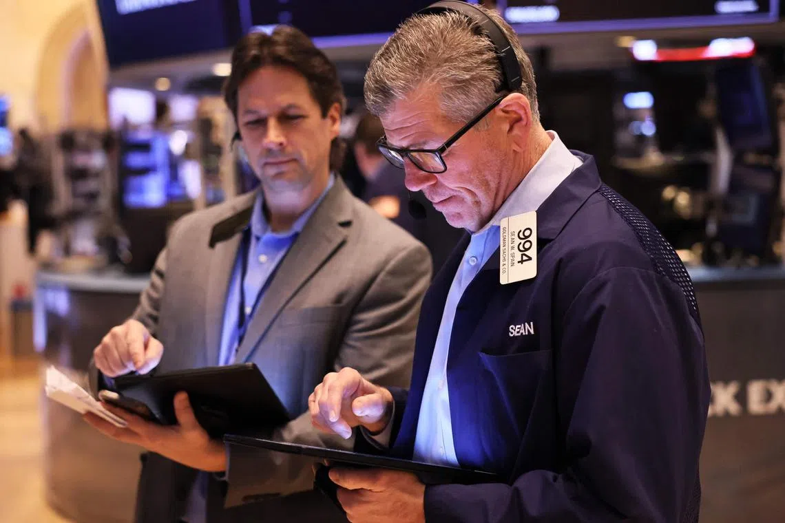 Traders work on the floor of the New York Stock Exchange, during morning trading on Jan 26, 2023.