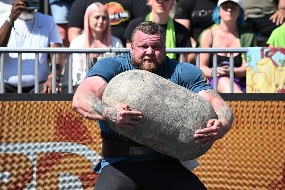Tom Stoltman of Britain competing in the natural stone medley during the qualifying round at the World's Strongest Man competition on May 16, 2025 in Sacramento, California. 