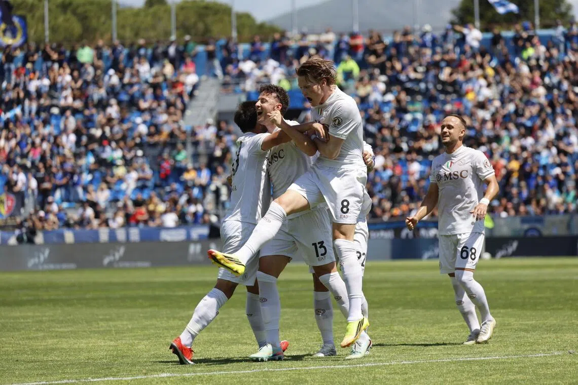 Napoli players celebrate after Amir Rrahmani's goal put them 2-0 up against  Pisa in their Italian Serie A soccer match at Arena Garibaldi stadium in Pisa, Italy on May 17, 2026. The visitors won 3-0.