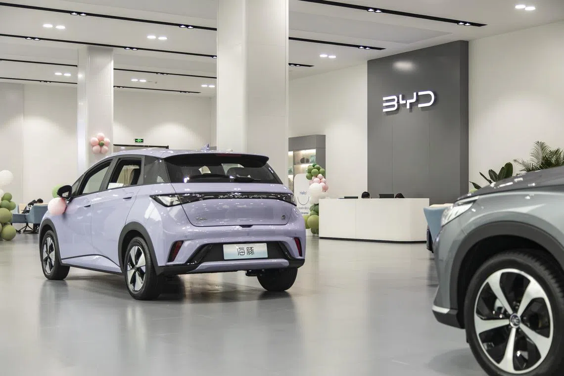 Amid slumping auto sales, car brands are going to extremes to stay competitive, offering dealership giveaways and deep discounts. 