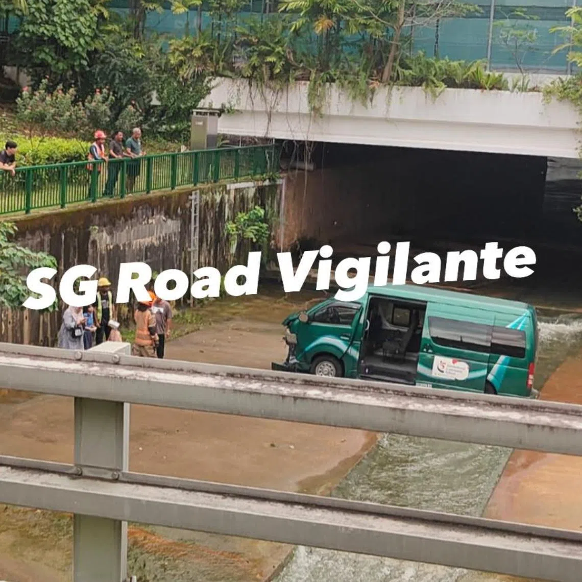 A minibus that spots the logo of International Community School fell into a Bukit Panjang canal.
