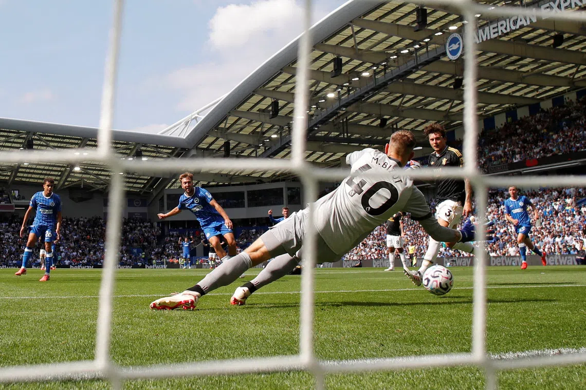 Soccer Football - Premier League - Brighton & Hove Albion v Aston Villa - The American Express Community Stadium, Brighton, Britain - August 23, 2026 Brighton and Hove Albion's Jack Hinshelwood scores their fourth goal past Aston Villa's Marco Bizot Action Images via Reuters/Andrew Couldridge
