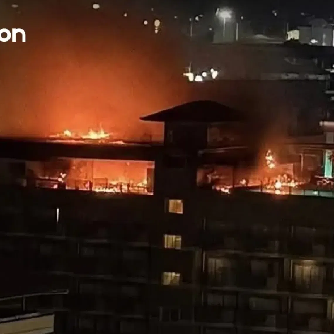Sparks from a short circuit on the hotel's roof reportedly reached palm-thatch decorations, causing the flames to spread quickly.