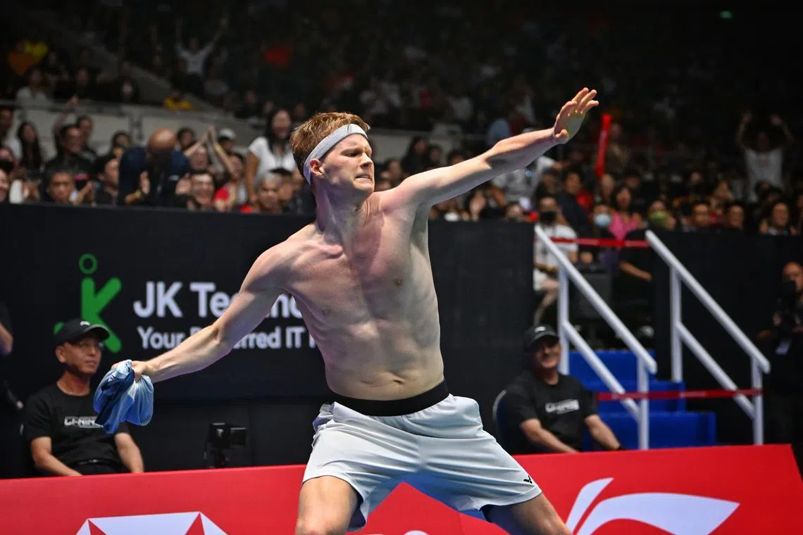 Denmark's Anders Antonsen celebrating his Singapore Open semi-final victory over Japan's Kodai Naraoka.