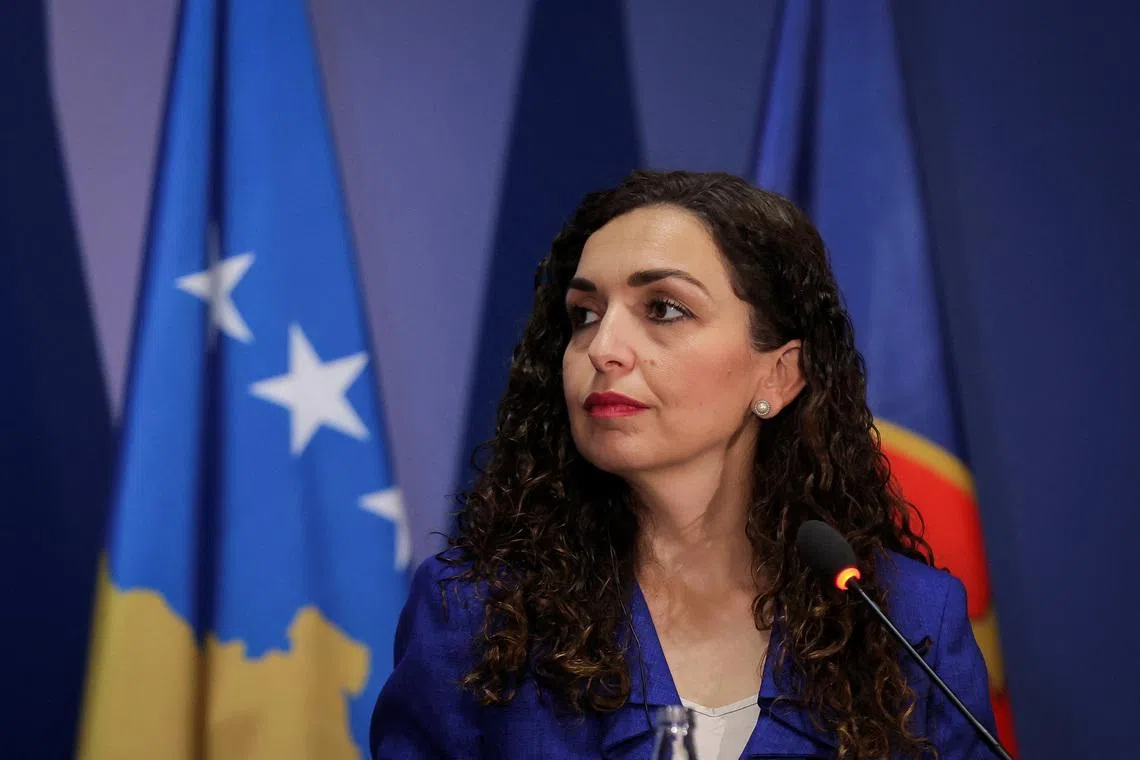 Kosovo's President Vjosa Osmani looks on during a press conference with German Foreign Minister Johann Wadephul (not in picture) in Pristina, Kosovo, November 18, 2025. REUTERS/Valdrin Xhemaj