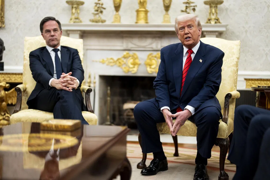 US President Donald Trump (right) answering media questions with visiting Nato Secretary-General Mark Rutte, in the Oval Office of the White House on March 13.