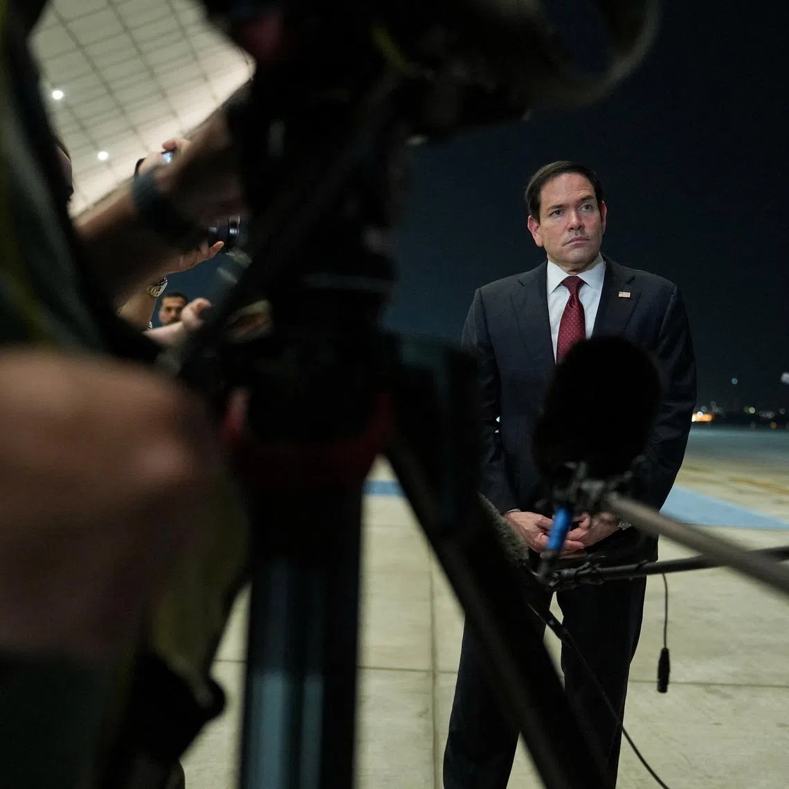U.S. Secretary of State Marco Rubio speaks to the media upon his arrival at Al Bateen Executive Airport to discuss the interim deal between the U.S. and Iran with Arab Gulf allies, in Abu Dhabi, United Arab Emirates, June 23, 2026. REUTERS/Eric Lee/Pool