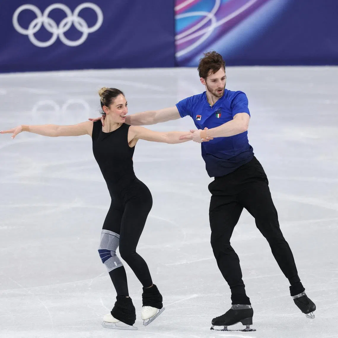 Milano Cortina 2026 Olympics - Figure Skating Training - Milano Ice Skating Arena, Milan, Italy - February 04, 2026. Sara Conti of Italy and Niccolo Macii of Italy during training REUTERS/Claudia Greco
