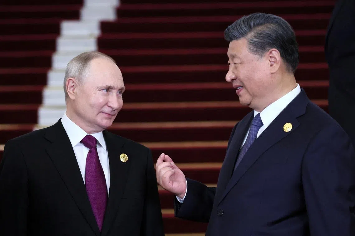 Russian President Vladimir Putin is welcomed by Chinese President Xi Jinping during a ceremony at the Belt and Road Forum in Beijing, China, October 17, 2023. Sputnik/Sergei Savostyanov/Pool via REUTERS/ File Photo