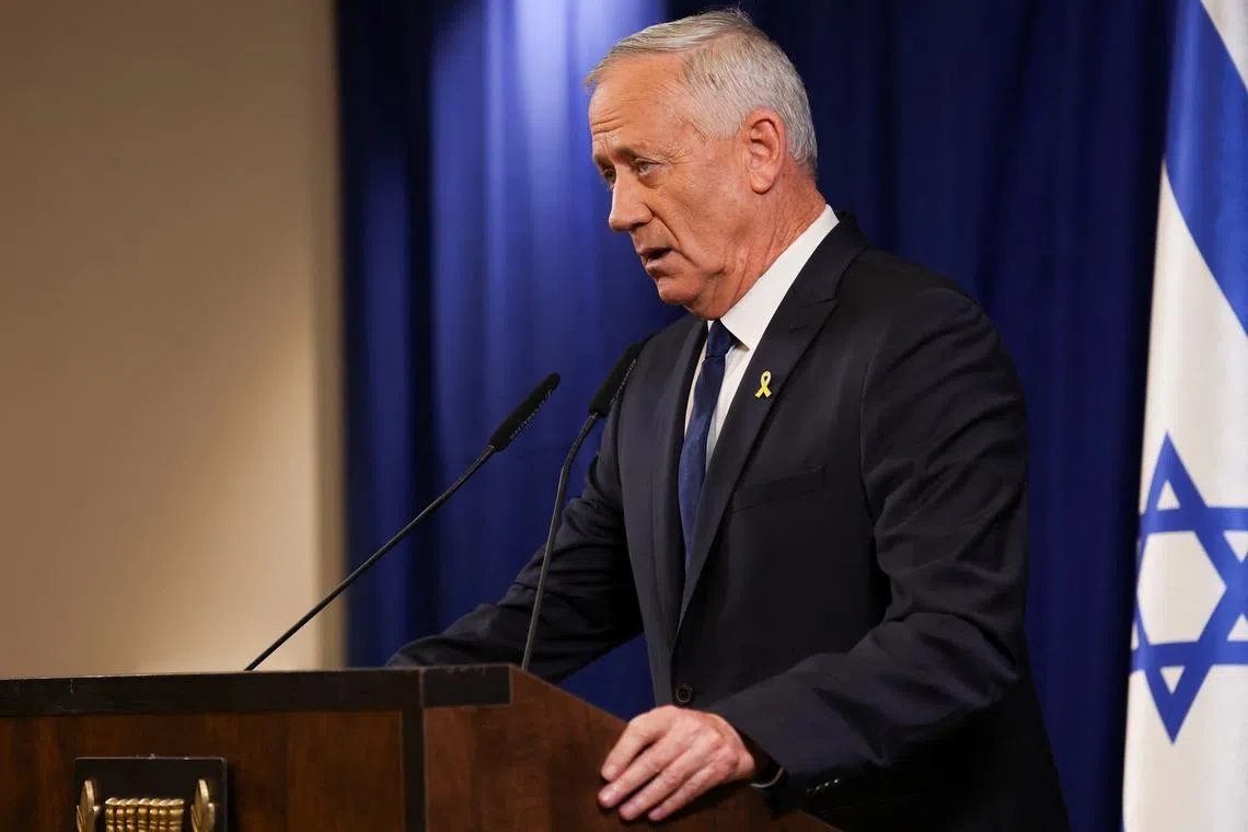 Israeli Minister Benny Gantz addresses the media after his ultimatum to withdraw his centrist party from Israeli Prime Minister Benjamin Netanyahu’s emergency government expired, in Ramat Gan, Israel June 9, 2024. REUTERS/Nir Elias