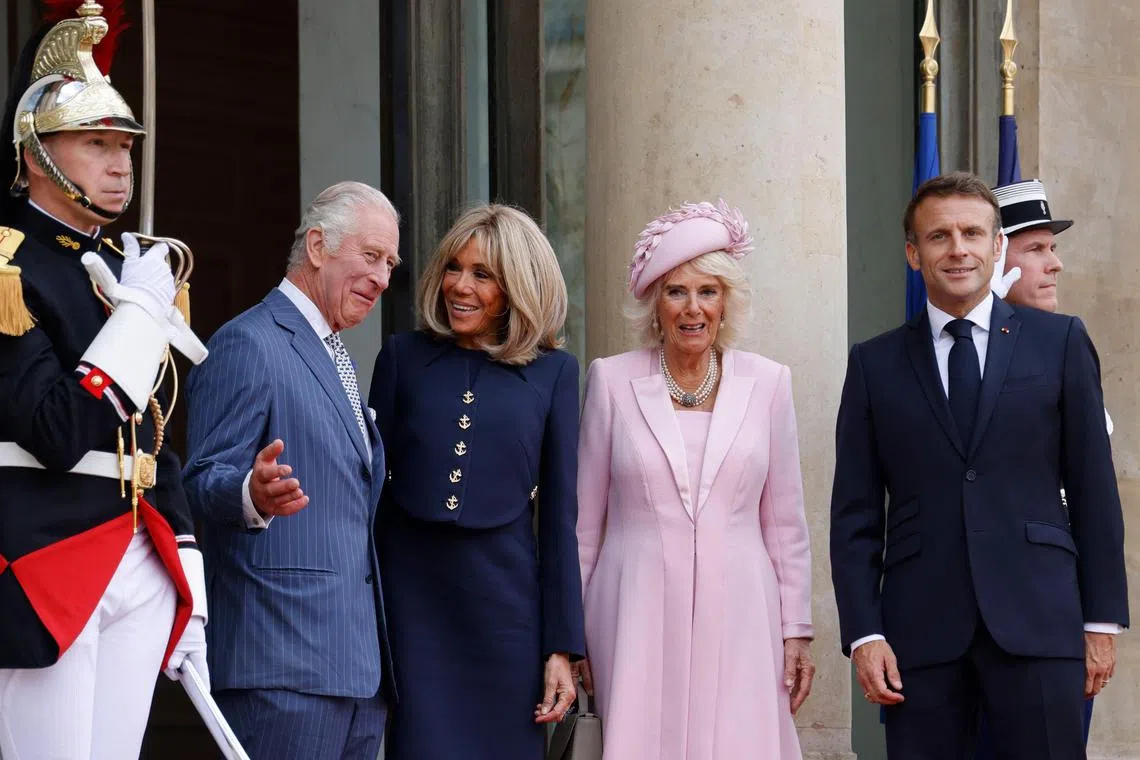 King Charles (far left) and Queen Camilla (third from left) are welcomed to the Elysee Palace in Paris by Mr Macron and his wife, Brigitte.