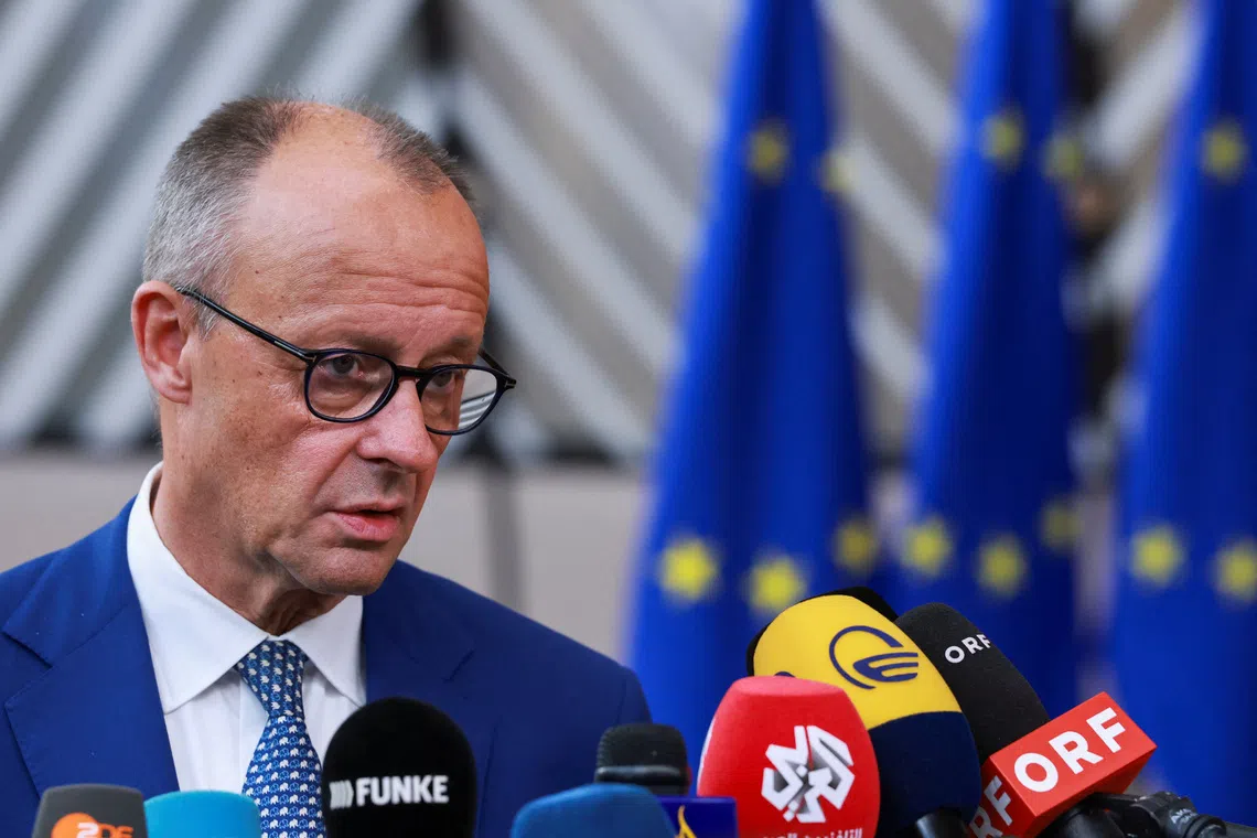German Chancellor Friedrich Merz speaks to the members of the media during arrivals for European Union leaders' summit in Brussels, Belgium October 15, 2026. REUTERS/Stephanie Lecocq