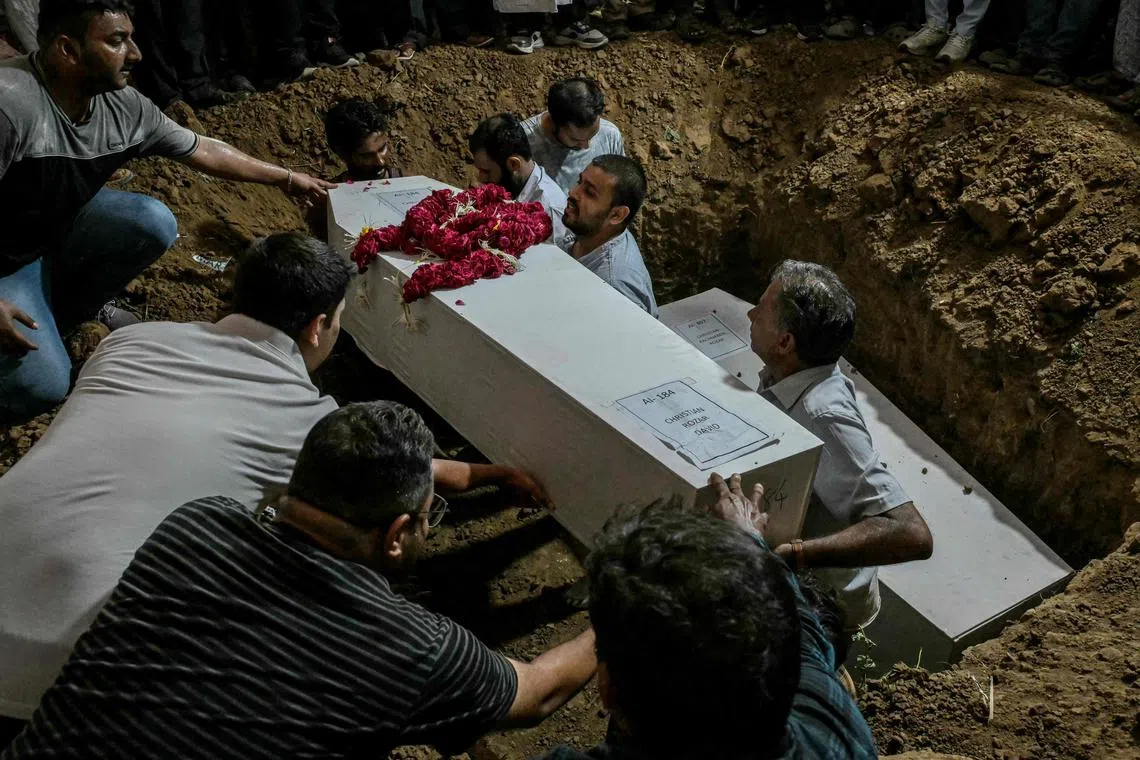 A burial ceremony for a victim of the Air India flight crash in Ahmedabad on June 15.